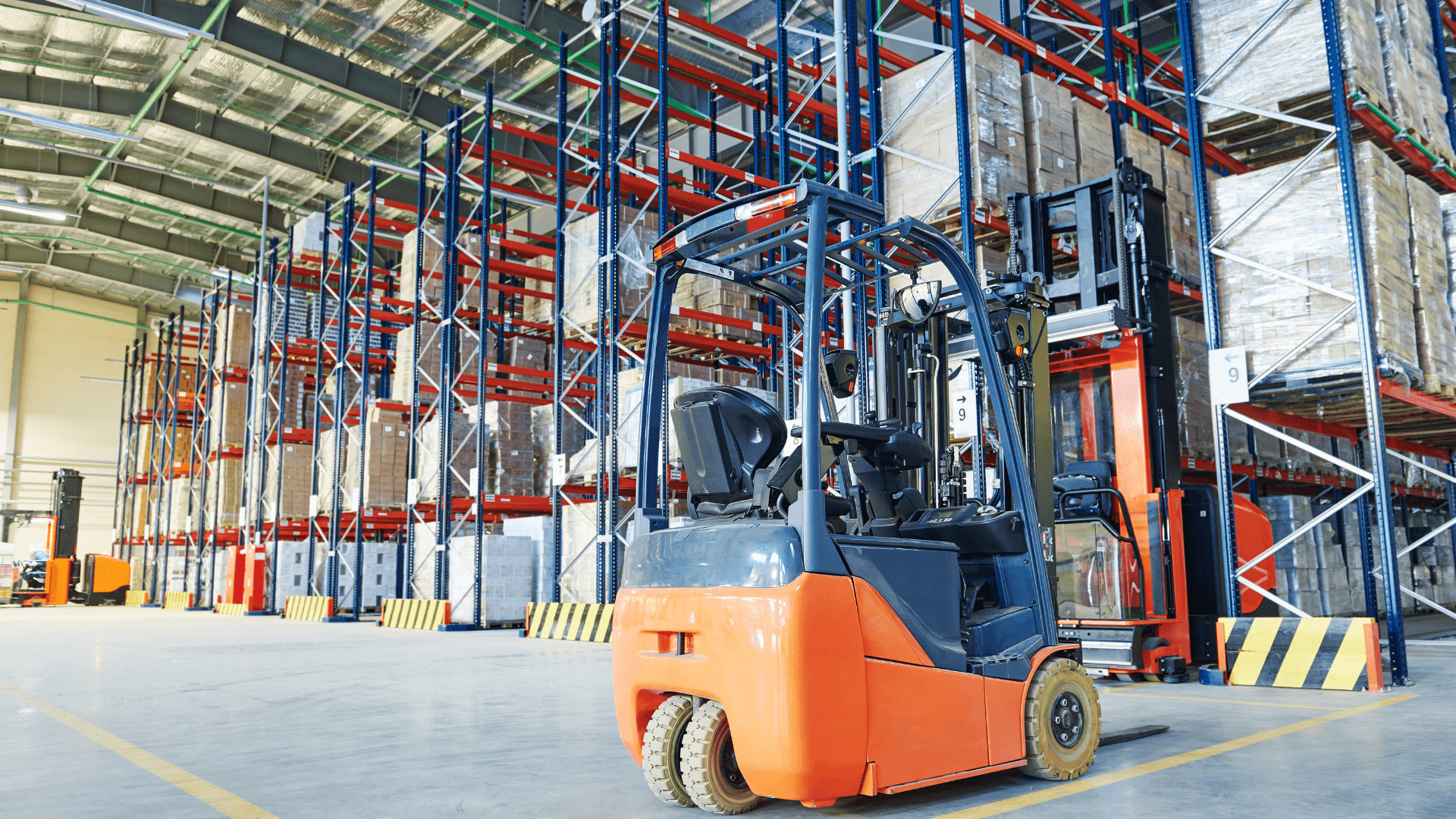 Forklift moving pallets inside a Parwaaz Logistics warehouse